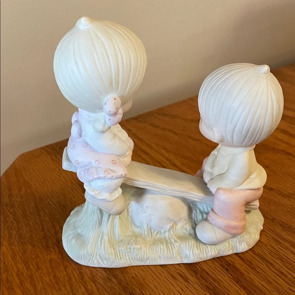 Precious Moments Figurine “Love Lifted Me”